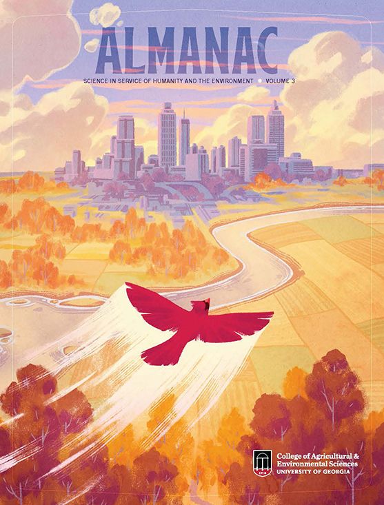 Illustrated magazine cover featuring a red cardinal flying over an autumnal forest toward Atlanta's skyline