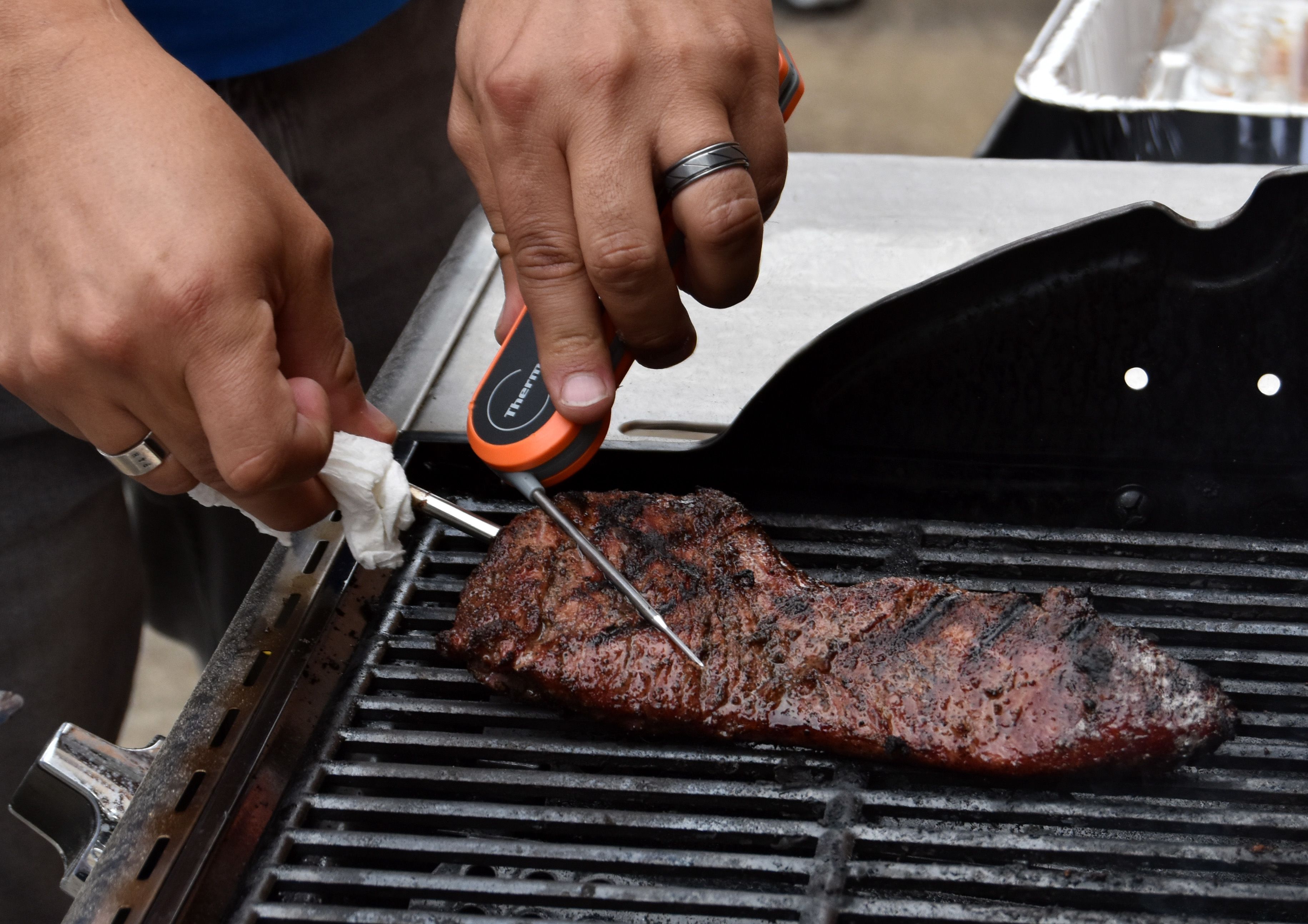 Gonzalez tests the internal temperature of a tri-tip steak