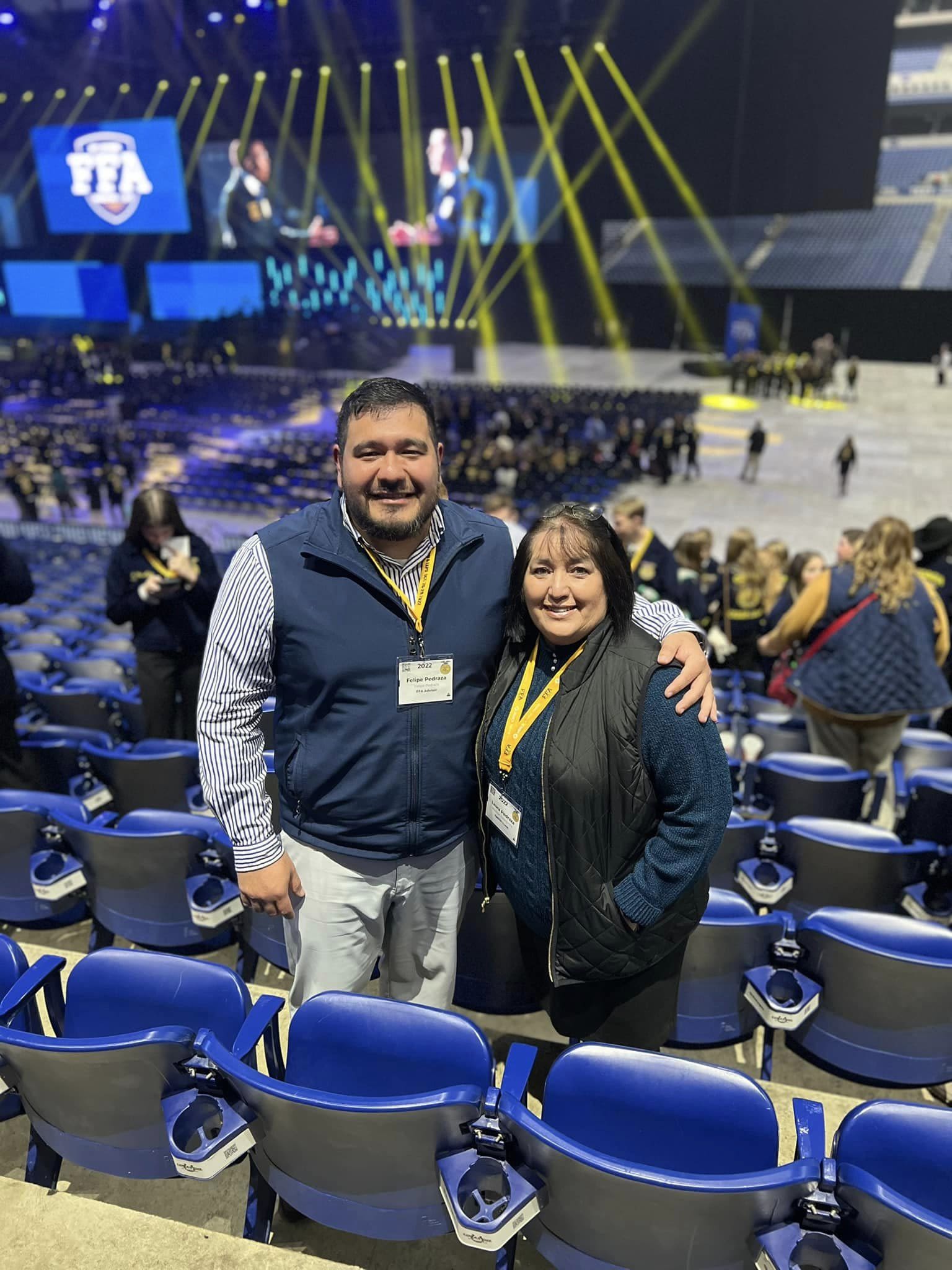 Pedraza poses with his mother, Laura, in an Indianapolis stadium for the National FFA Convention.