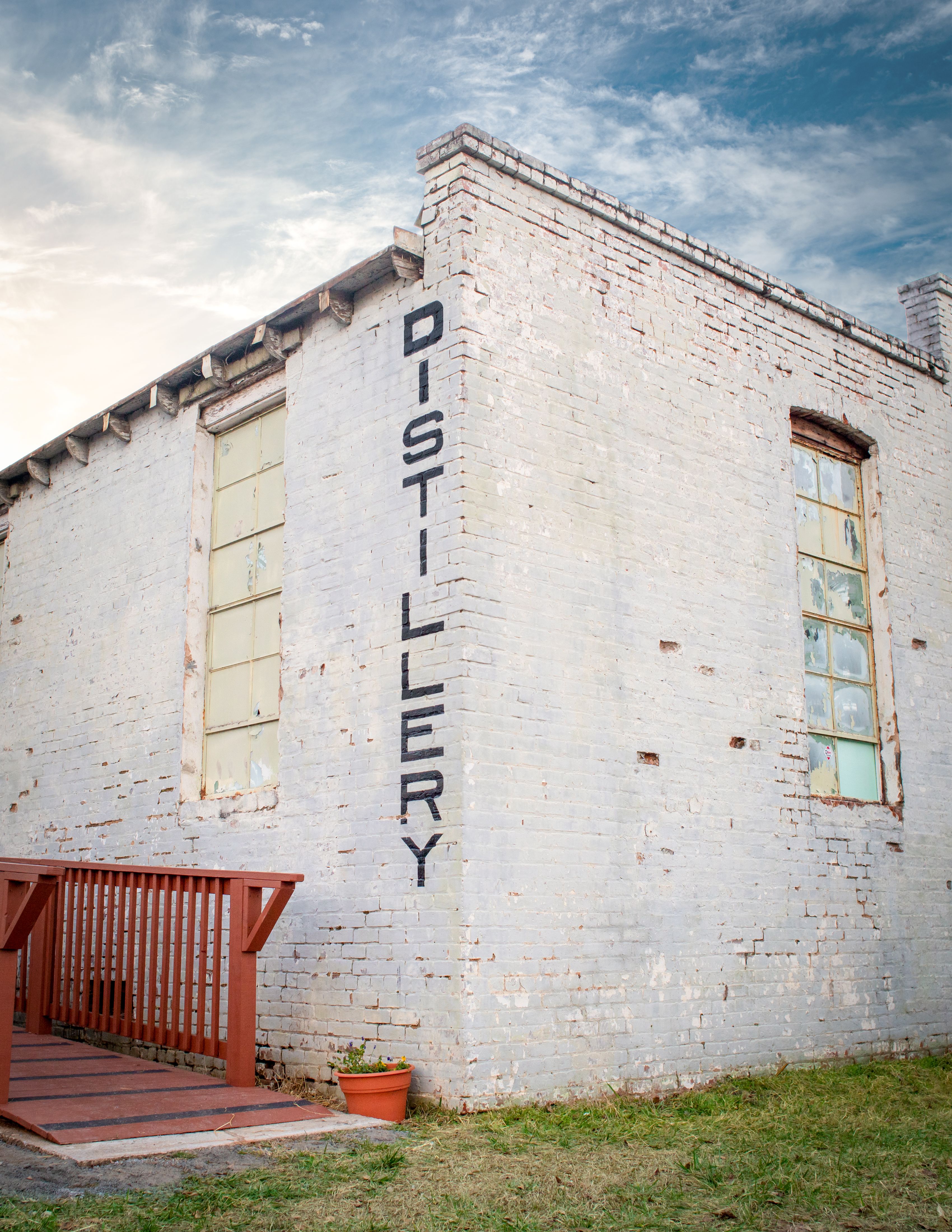 The exterior of the Soldier of the Sea building, which has "DISTILLERY" written vertically down the side